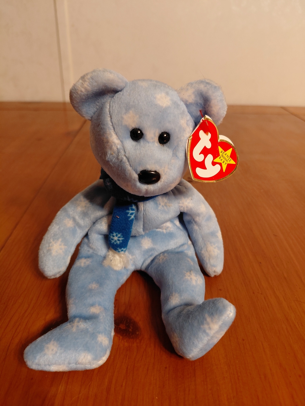 Ty Beanie Baby called "1999 Holiday Teddy,"